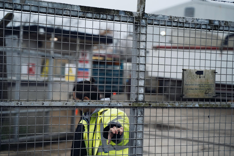 Security closes the gate at St Merryn's Meat Slaughterhouse, Bodmin, Cornwall