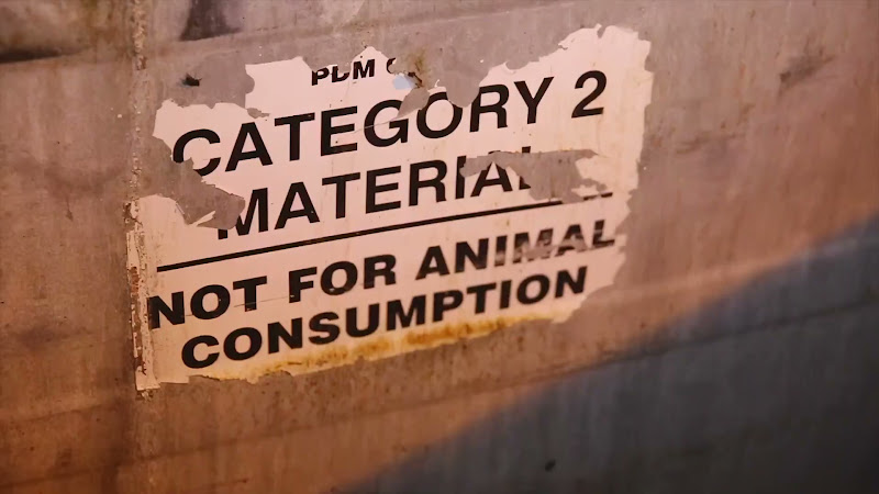 Sign on the side of farm dead bin